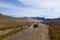 Jeeps pass through Bromo mountain savana