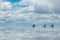 Jeeps in the salt lake salar de uyuni, bolivia