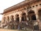 Jehangir woman view from back in dress inside Fort Orchha, Hindu religion, ancient architecture, Orchha, Madhya Pradesh, India