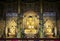 JEJU ISLAND,  SOUTH KOREA- OCTOBER 15, 2019: Golden Buddha statues inside Dharma Hall of the Yakcheonsa Temple on Jeju Island,