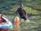 Jeju, South Korea - October 15, 2018: Haenyeo Women Diver Show to collect seaweed, shellfish and other seafood at Seongsan