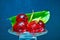 jelly strawberry on blue background,beautiful jelly,jam on glass,jello small piece
