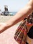 Jellyfish sting in the arm of a woman on the beach