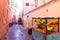 JEMMA DAR FNA, THE MAIN BAZAAR, MARRAKECH, MOROCCO, NOVEMBER 10, 2018. People walking on a corridor surrounded by booths