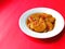 Jengkol stew, typical Indonesian food with red background, August 8, 2021