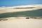 Jericoacoara, Ceara state, Brazil - July 2016: Buggy with tourists traveling through the desert Jericoacoara National Park