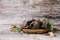 Jerked meat, cow, deer, wild beast or biltong in wooden bowls on a rustic table