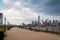 Jersey City, NJ / USA - March 2016: Liberty State Park at the spring cloudy day, Hudson river shore with manhattan skyline