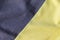 Jersey cotton fabric texture. Crumpled gray and yellow textile background