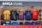 Jerseys, Scarves and Other stuffs of Official Merchandise for Sale outside Barcelona Soccer Stadium, Camp Nou, Spain