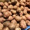 Jerusalem artichoke root, tuber vegetable, large amount of Jerusalem artichoke, healthy vegetables full of vitamins, vegetarian fo