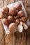 Jerusalem artichoke sunroot tubers. Helianthus tuberosus closeup on the table, Vertical top view