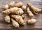 Jerusalem artichoke on wooden background.