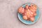 Jerusalem artichokes on a brown textured background