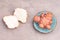 Jerusalem artichokes on a brown textured background