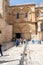 Jerusalem, Israel - 10 April, 2023. Crowd of tourists and pilgrims at the line to enter the church of holy sepulchre Saturday of
