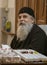 Jerusalem, Israel - 2019-04-26 - orthodox Greek Christian priest talks to person off-camera