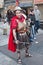 JERUSALEM, ISRAEL - MARCH 15, 2006: Purim carnival. A young man dressed in a suit of a Roman soldier with a sword in his hand.
