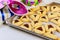 Jerwish food Hamantaschen cookies with jam, tallit and mask