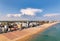 Jesolo in a aerialial panoramic view on blue sea - golden beach and sea with  back city