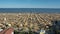 Jesolo, Italy. Beach umbrellas and sun beds at Italian sandy beaches. Peak season, many people and a lot of mess. Adriatic coast