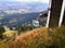 Jested, Czech republic - october 06, 2012: green cabin of cableway moving to top named Jested with Liberec city on background