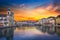 Jesuit Church on River Reuss with historic Swiss buildings on riverside