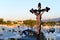 Jesus on Christ cross crucifixion at graveyard