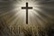 Jesus Christ cross surrounded by light and risen text on a rock background for Easter