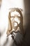 Jesus Christ face paper template and shadow with thorn crown as christian religion savior God