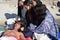 Jesus Christ lying on crying women`s lap street drama, community celebrates Good Friday representing the events that led to the hi