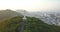 Jesus Christ`s Statue in Vung Tau, Vietam, Asia, South-East Asia, 4k drone footage. Sunset and many buildings visible