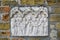 Jesus Christ and the twelve apostles, panel carved in stone