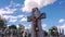 Jesus cross with timelapse clouds