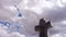 Jesus cross with timelapse clouds
