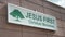 Jesus first Christian ministries rectangle sign in green writing on white