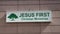 Jesus first Christian ministries rectangle sign in green writing on white