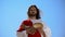 Jesus holding bread and bottle of wine, sharing sacramental meal, Holy Eucharist