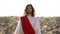 Jesus looking at camera, preaching Christian faith in desert, soul salvation