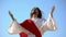 Jesus raising hands to sky and praying, resurrection and ascension of Christ