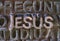 Jesus written in metallic letters