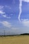 Jet airplane long smoke on the blue sky.
