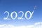 Jet drawing 2020 cloud in sky. happy new year 2020 concepts