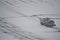 Jet fuel truck drives on snow covered tarmac