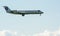 A jet passenger plane in a blue sky