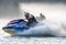 Jet ski racers drive watercrafts splashing in sunset while racing at South Russian Aquabike