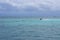 A jet ski races across the Caribbean inside the Meso-American reef.