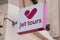 Jet tours text brand and pink sign logo front of office on holidays travel agency