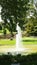 Jet of water in the pond of the MosÃ©n Cinto Verdaguer gardens in Montjuic