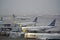 JetBlue airplanes stacked at JFK gates during snowstorm